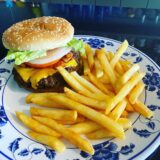 Bacon cheeseburger with French fries