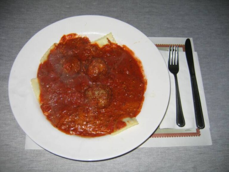 Ravioli and meatballs in meat sauce