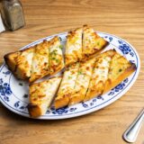 Garlic bread with melted cheese