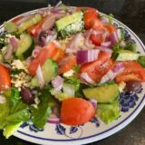 Greek salad with tomatoes, cucumber, olives and feta